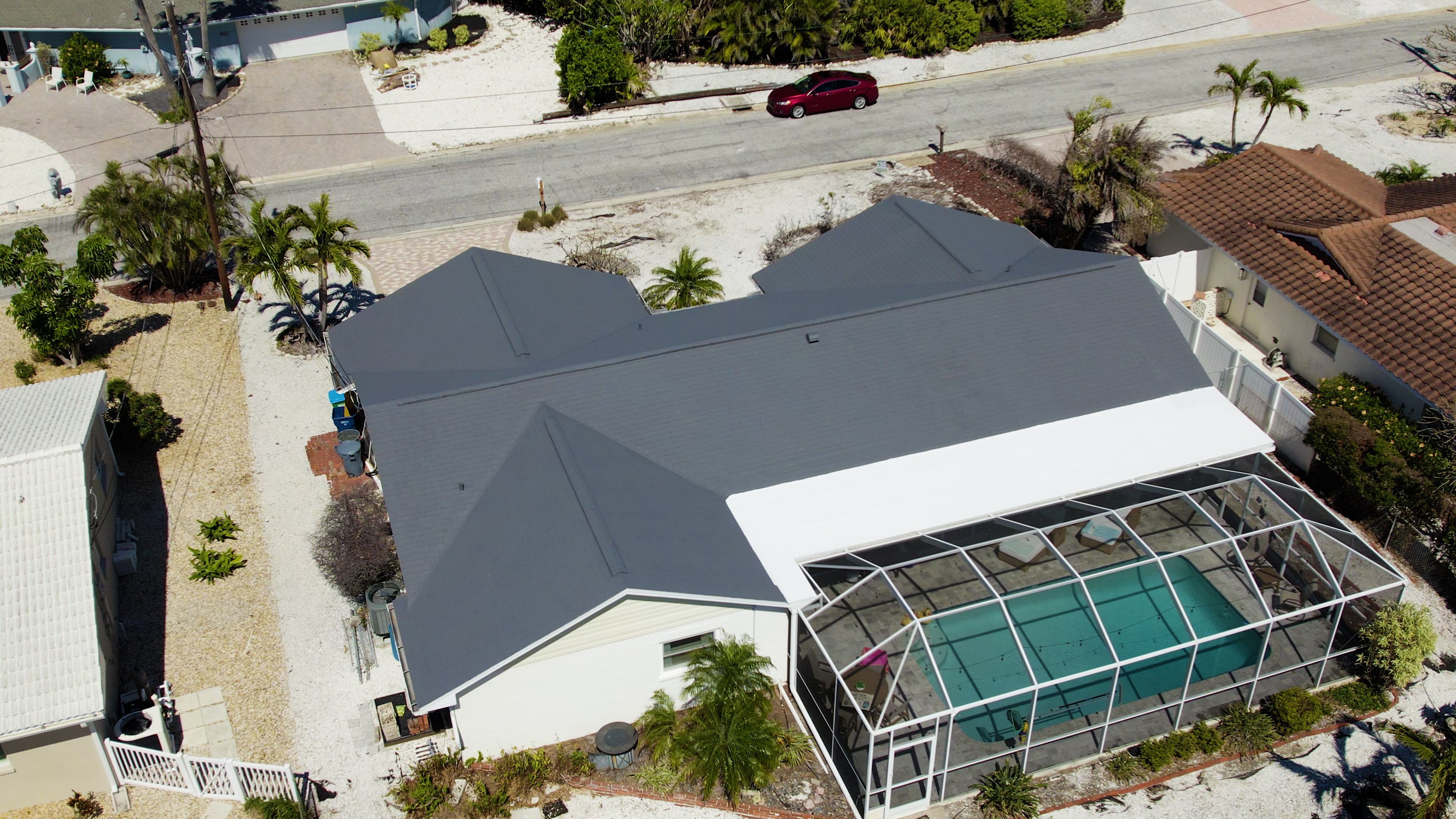 Close-up of Peak 301 bio-oil treatment being absorbed into asphalt shingles